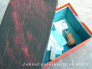 Doos met vakantieherinneringen